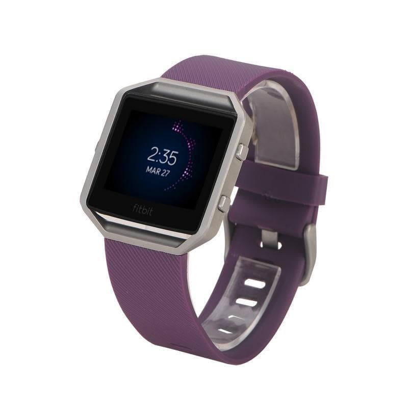 Stylish purple Fitbit strap with sleek silver watch frame.