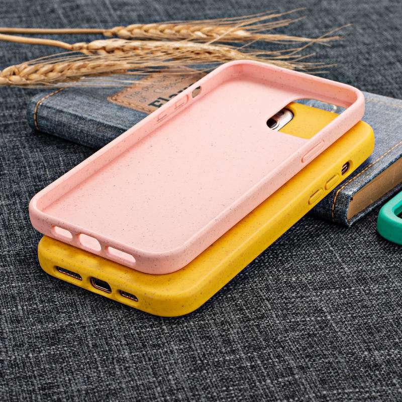 Pink and yellow Eco-Friendly Slimline iPhone Cases made from wheat straw, showcasing inner texture and charging port cutouts.