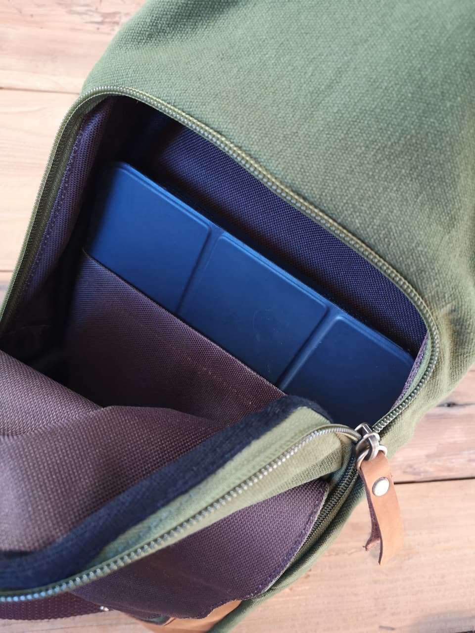 Interior of Zoodle Olive iPad Sling Bag showing secure tablet compartment, ideal for carrying iPads and essentials in South Africa.