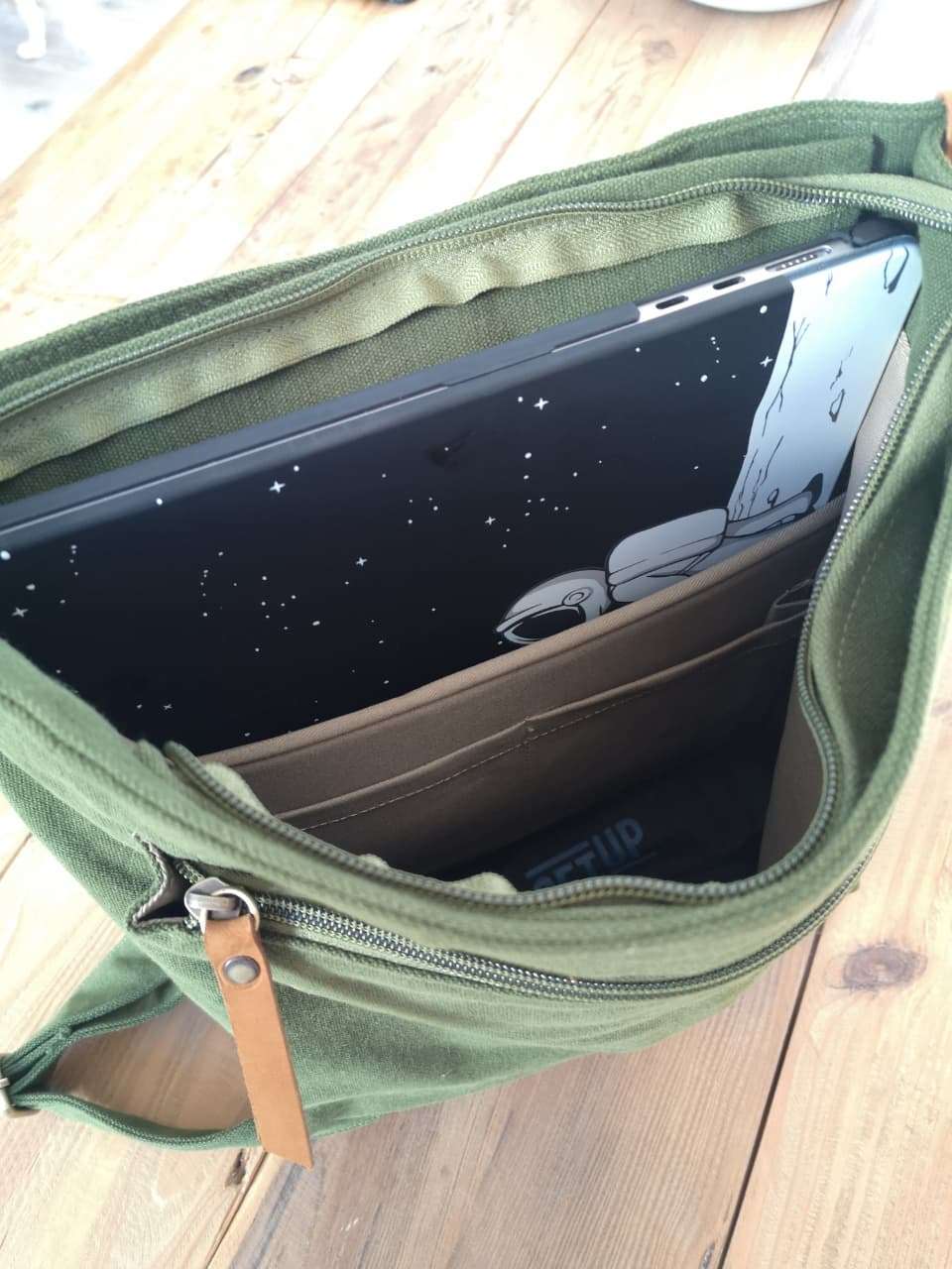 Interior view of Zoodle Laptop Backpack with padded compartment holding a laptop, ideal for tech-savvy users in South Africa.