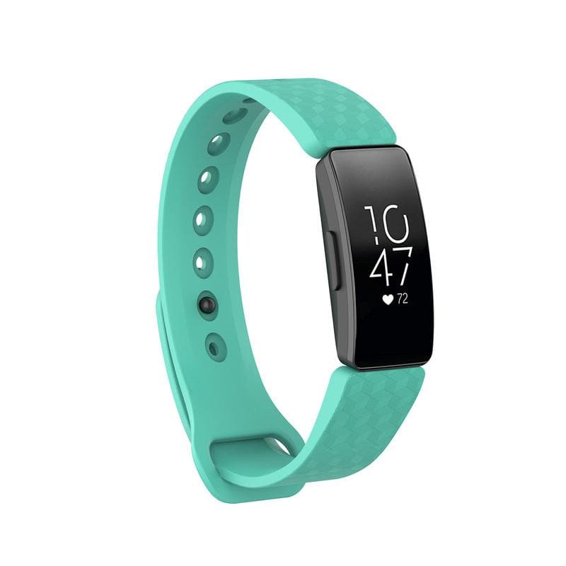 Sleek Fitbit Inspire fitness tracker with teal band and heart rate monitor.