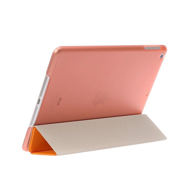 Rose gold iPad with smart cover stand, rear view display.