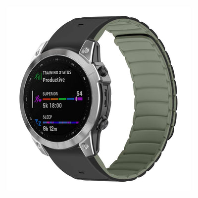 Shell QuickFit Magnetic Silicone Strap for GARMIN in black and green, attached to a smartwatch, offering a modern, secure magnetic clasp design.