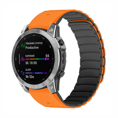 Shell QuickFit Magnetic Silicone Strap for GARMIN in orange and black, shown on a smartwatch with a sleek, secure fit for 22mm or 26mm sizes.