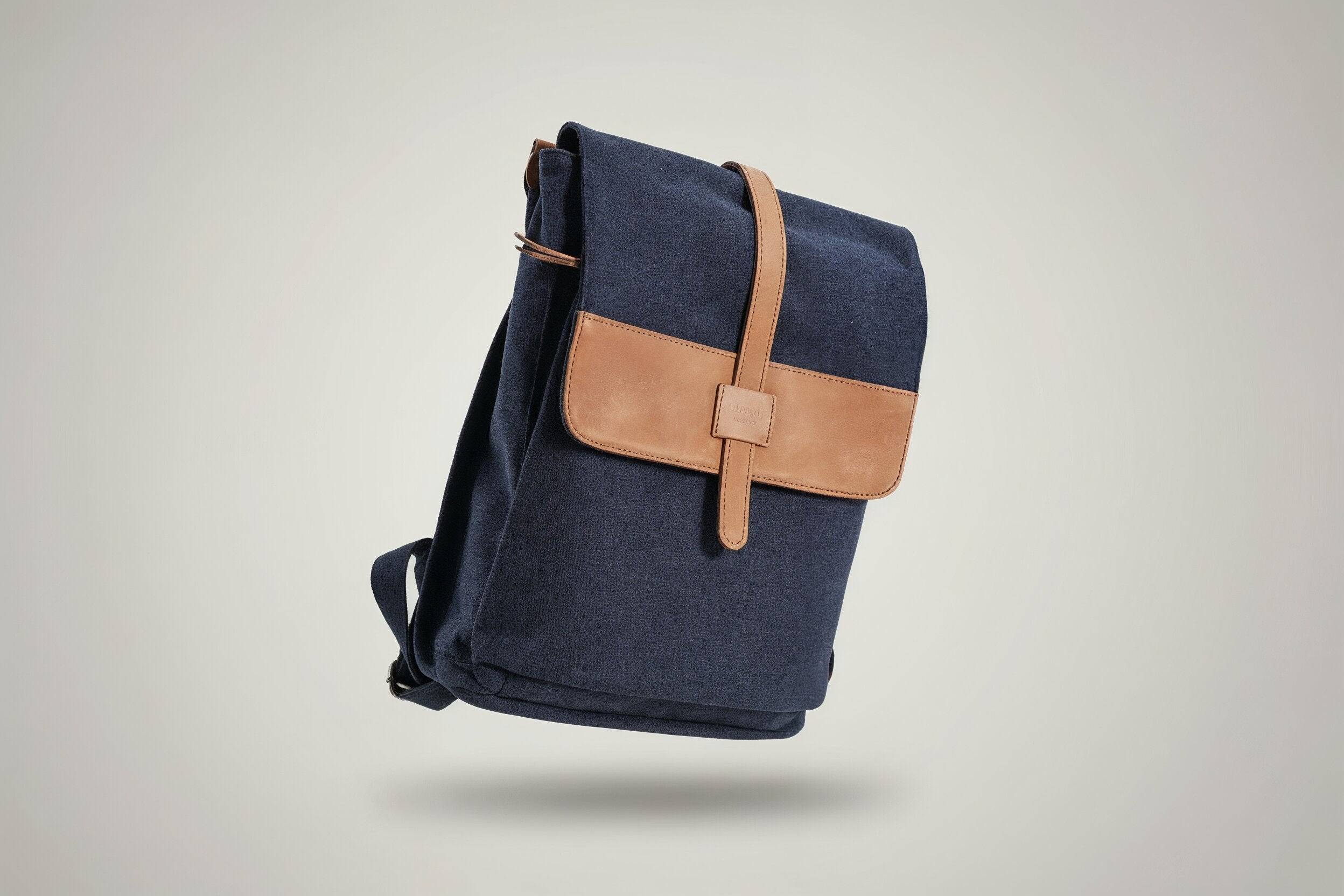 Zoodle Laptop Backpack in navy blue canvas with tan leather flap, handmade laptop bag for urban professionals in South Africa.