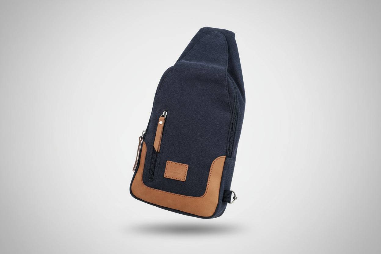 Zoodle iPad Sling Bag in navy blue 14oz stone wash canvas with leather trim, compact and stylish for urban travel in South Africa.