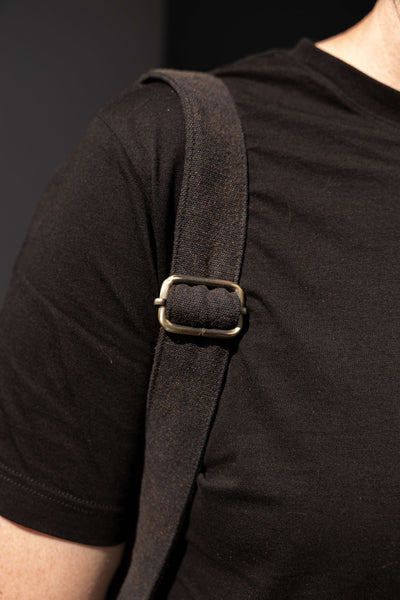 Close-up of Zoodle Laptop Backpack strap with brass buckle on 14oz stone wash canvas. Durable and stylish for everyday laptop carry in South Africa.