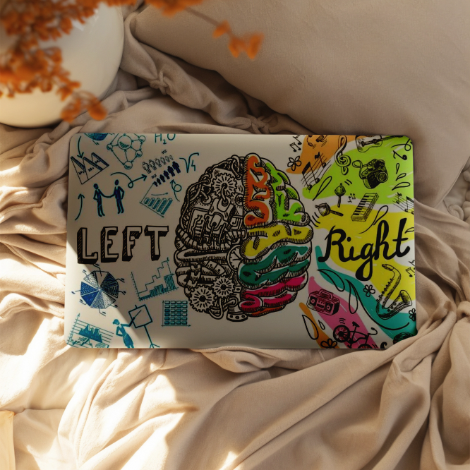 Macbook case with brain illustration labeled 'LEFT' and 'RIGHT' on a soft surface with decorative elements.
