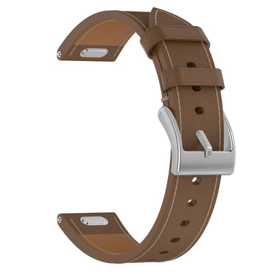 Close-up of Zoodle leather strap for Garmin 20/22mm in brown with silver buckle, showcasing premium stitching and adjustable comfort fit.